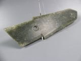 a picture of a piece of stone with a hole in it