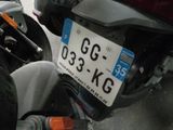 a license plate on the back of a motorcycle