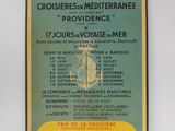 une vieille affiche présentant un bateau de croisière sur l'eau
