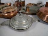 many different types of pots and pans on the table