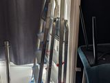 a ladder leaning up against a window next to a chair