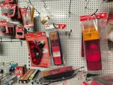 many different items on the wall in the store