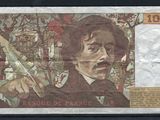 le recto d'un billet de banque sur lequel figure l'image d'un homme tenant un couteau