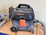 a small blow dryer sitting on top of a table