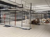 a large room with a lot of shelves in it