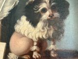 an oil painting of a dog sitting on top of a table next to a feather