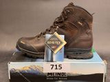 a box with a pair of hiking boots on top of it