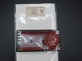 a piece of paper that has a wax seal on it