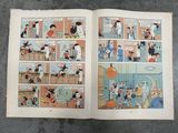 an open book with a comic strip in it