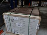 a pallet with a box of wood on it in a warehouse