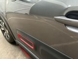 a close up of a car ' s door handle and door handle