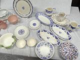 a table with a lot of plates and bowls on it