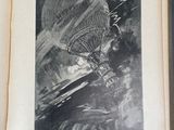 an open book with a drawing of a hot air balloon flying over a city