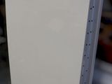 a stack of papers sitting on top of a table