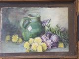 a painting of a green vase and flowers in a gold frame