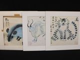 three chinese ink paintings of animals and birds on a black background