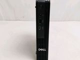 a dell desktop computer sitting on a white surface