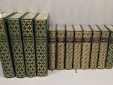 a lot of books that are sitting on a table