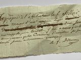 a close up of a piece of paper with writing on it