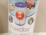 a close up of a blue and white pool filter on a counter