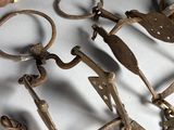 a lot of old tools that are laying on a table