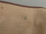 a close up of a piece of cloth with a hole in it