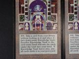 these are two cards from a card game with a picture of a cat
