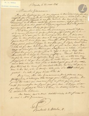 une lettre écrite à l'encre noire sur une feuille de papier