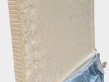 an image of a mattress with a sheet covering it