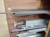 a lot of metal items that are sitting on a shelf