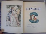 un livre ouvert avec la photo d'un homme et d'une femme