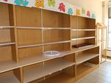 a room with shelves and shelves that have different types of items on them