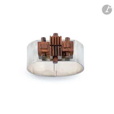 sterling silver ring with wood blocks in a clear glass dome