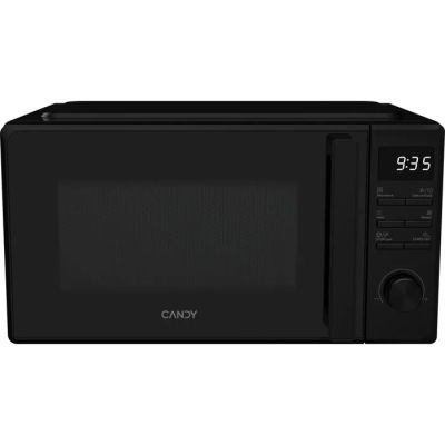 gros plan d'un four à micro-ondes noir sur fond blanc