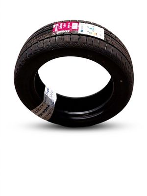 a tire that is sitting on a white surface