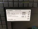 the back of a sony tv with a remote control on it