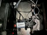 a close up of a machine with wires attached to it
