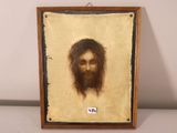 an old picture of a man with a beard in a wooden frame