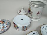 many different types of china dishes on the table