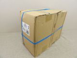 a cardboard box that is wrapped in blue tape