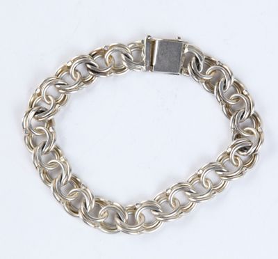 silver plated chain bracelet with a square clasp on a white background
