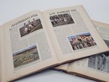 an open book on a table with pictures of people in the pages