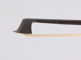 a close up of a violin bow on a white background