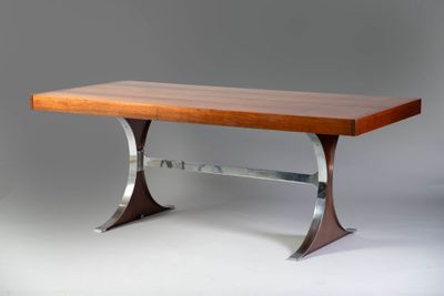 a wooden table with metal legs and a wooden top