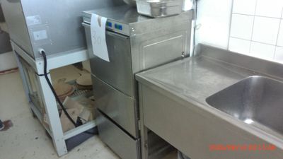 an image of a commercial kitchen with stainless steel appliances