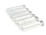 four clear acrylic tubes are stacked on top of each other