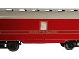 a red train car that is sitting on the tracks