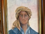 tableau représentant un homme portant un turban, dans un cadre en bois
