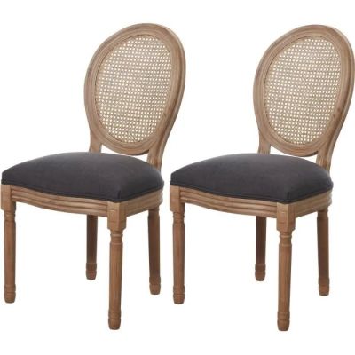 paire de chaises de salle à manger à dossier en rotin avec coussins rembourrés noirs