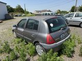 a small car that is parked in a parking lot